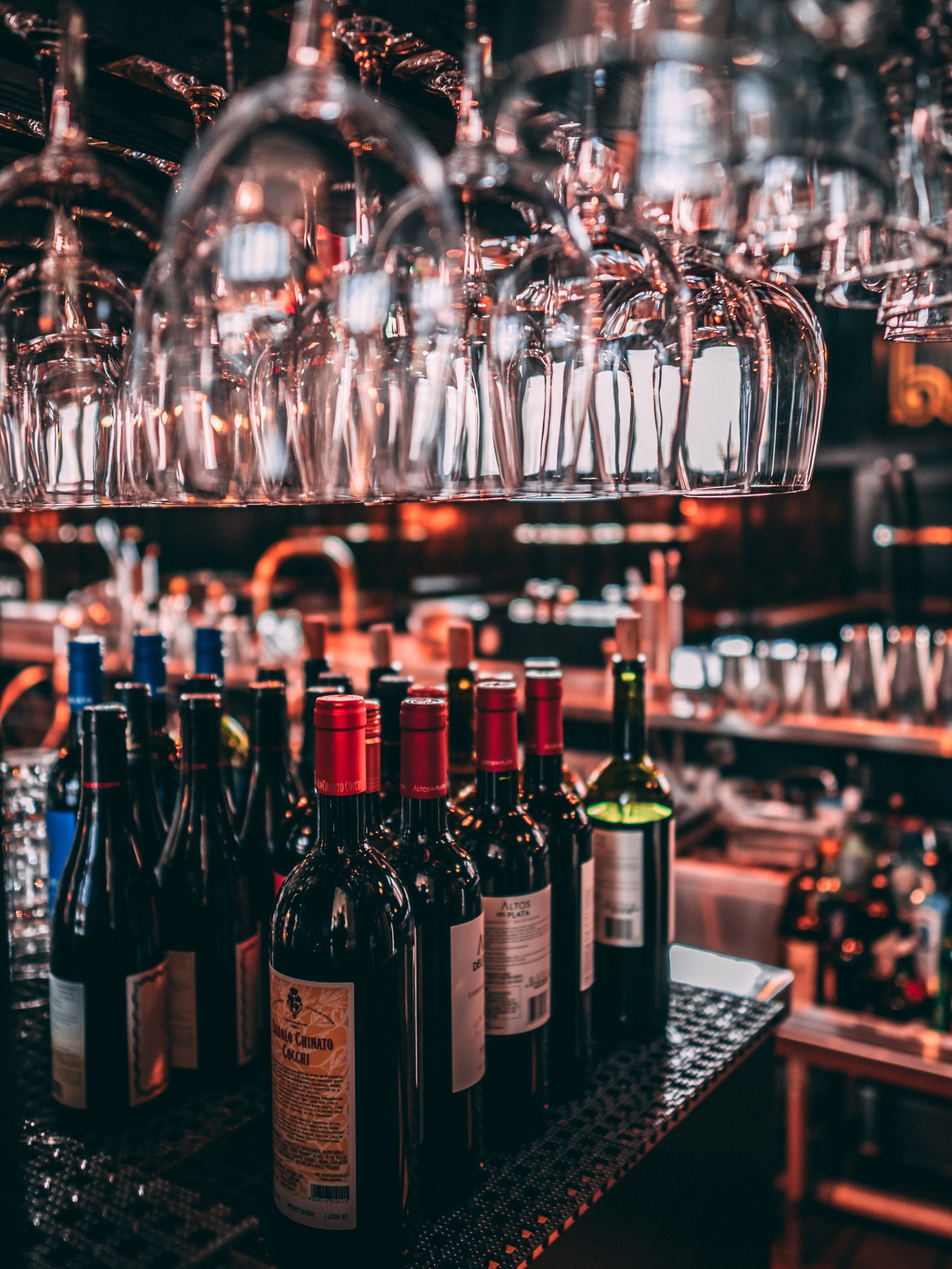 Wine bottles on a bar